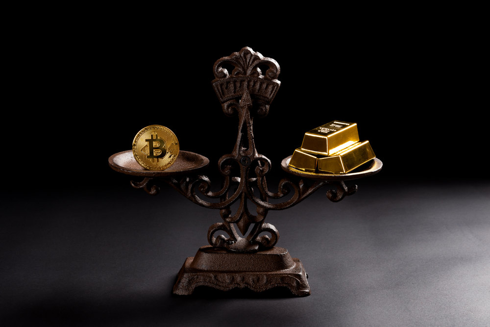 bitcoin-gold-bars-on-balanced-scale